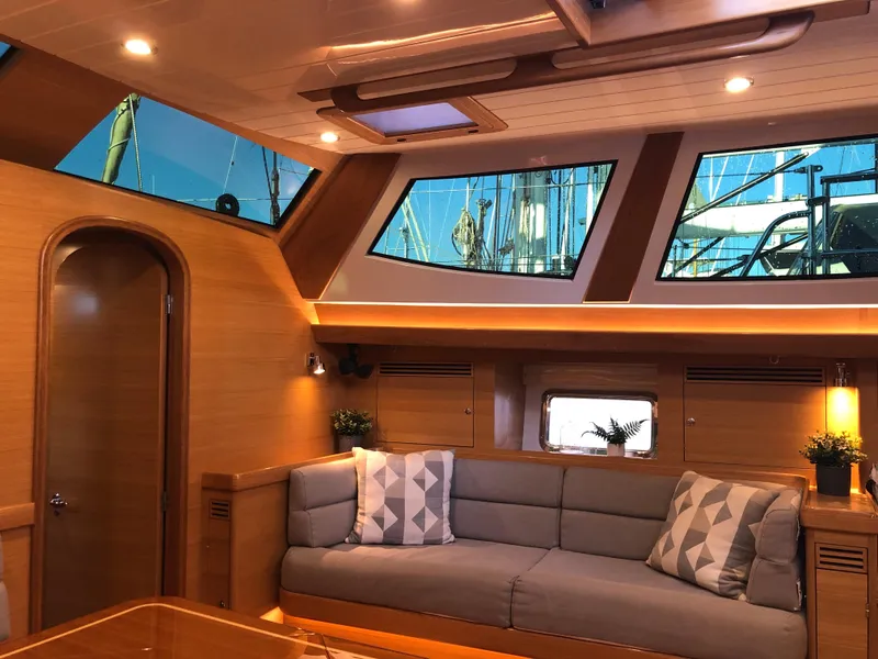 Slide: The Image of Luxurious interior of 2020 Bluewater 56 yacht with modern design and comfortable seating. - 30