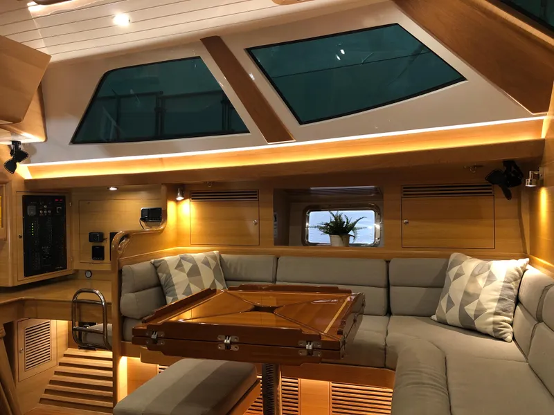 Slide: The Image of Luxurious interior of 2020 Bluewater 56 yacht with modern seating and ambient lighting. - 41