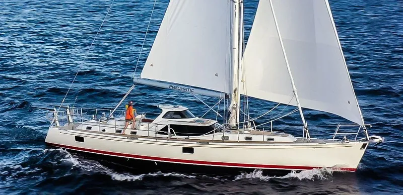 Slide: The Image of Sailing yacht Bluewater 56, 2020 model, cruising on open sea with full sails. - 9