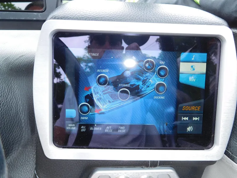 Slide: The Image of 2017 Malibu Wakesetter 24 MXZ touchscreen control panel. - 35