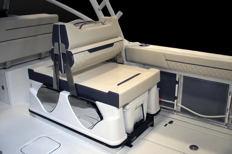 Slide: The Image of 2024 Blackfin 302 DC boat interior seating and storage area. - 8