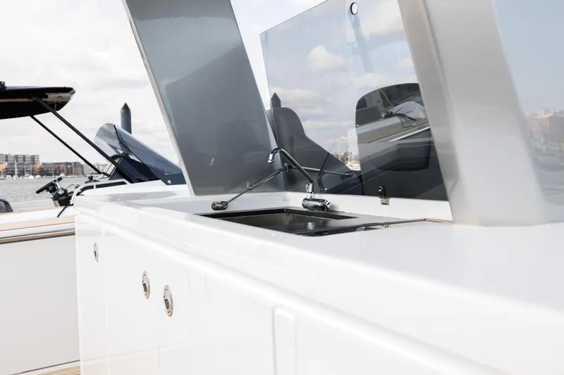 Slide: The Image of 2024 Pardo Yachts 43 model featuring a sleek outdoor kitchen area. - 17