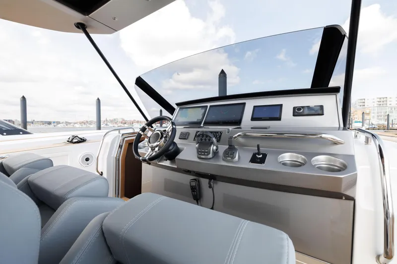 Slide: The Image of Helm station of 2024 Pardo Yachts 43 with modern controls and navigation equipment. - 24