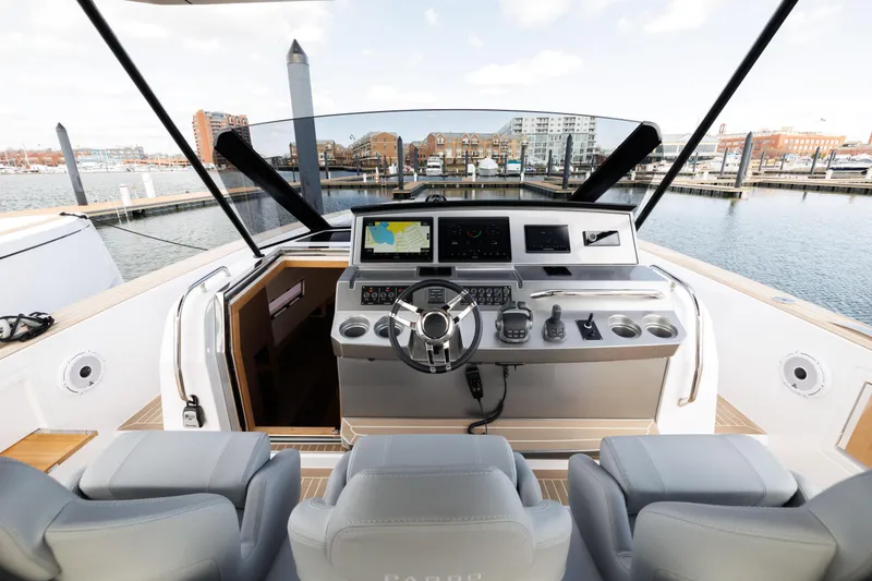 Slide: The Image of Cockpit view of 2024 Pardo Yachts 43, featuring modern navigation equipment and luxurious seating. - 26