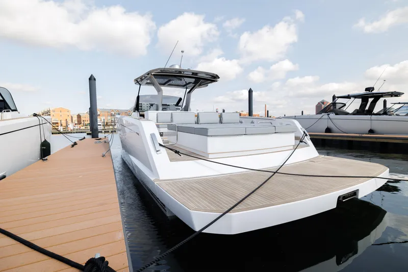 Slide: The Image of 2024 Pardo Yachts 43 docked at marina, rear view. - 3
