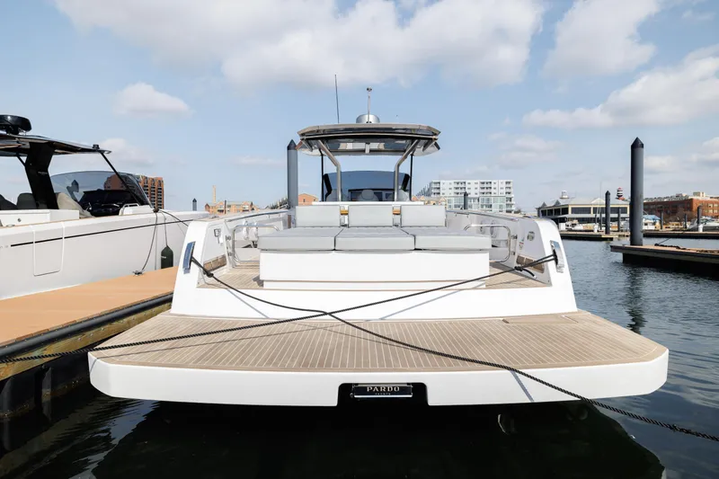 Slide: The Image of 2024 Pardo Yachts 43 docked at a marina, rear view. - 4