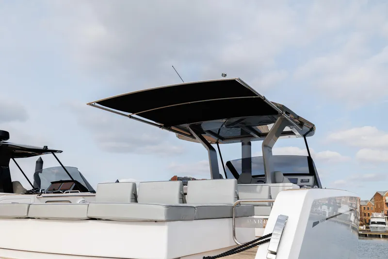 Slide: The Image of 2024 Pardo Yachts 43 with sleek design and spacious deck under a clear sky. - 44