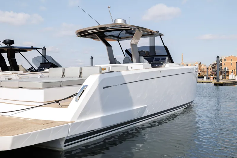 Slide: The Image of 2024 Pardo Yachts 43 luxury motor yacht docked in a marina. - 5