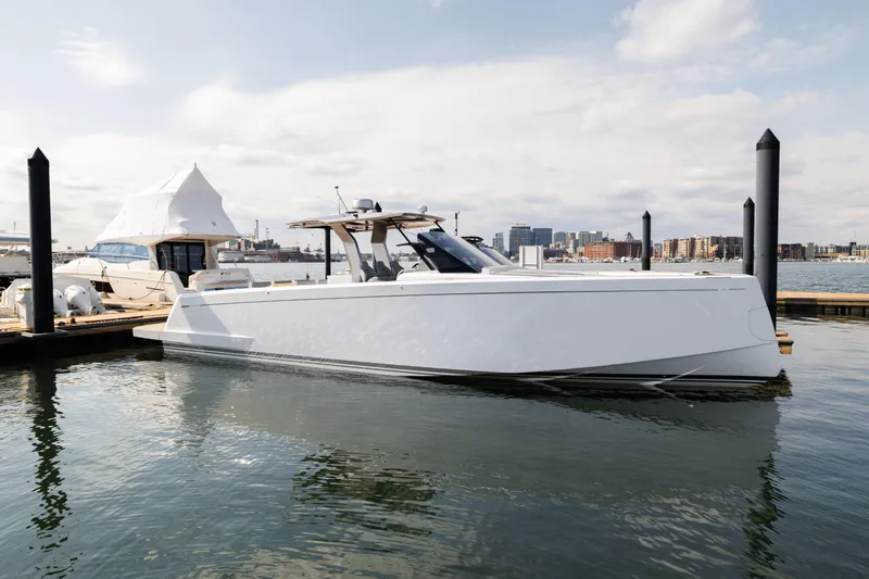 Slide: The Image of 2024 Pardo Yachts 43 docked in a marina on a sunny day. - 7