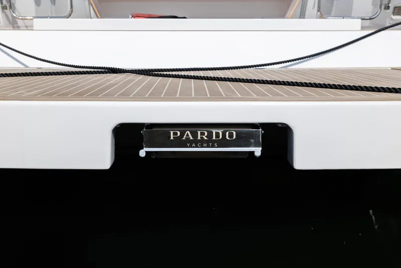 Slide: The Image of 2024 Pardo Yachts 43 stern view with logo and teak deck. - 8