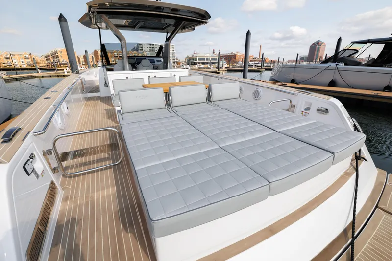 Slide: The Image of 2024 Pardo Yachts 43 luxury yacht with spacious sunbathing area docked at marina. - 10