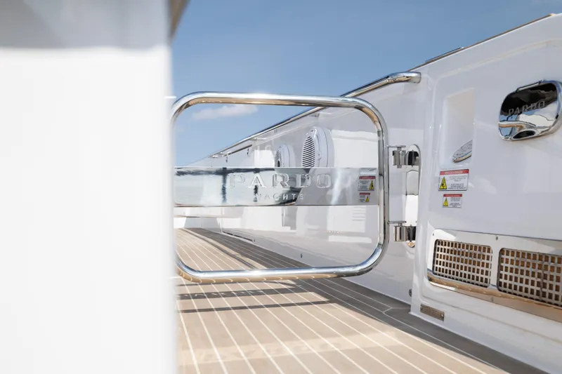 Slide: The Image of 2024 Pardo Yachts 43 deck with stainless steel gate and teak flooring. - 13