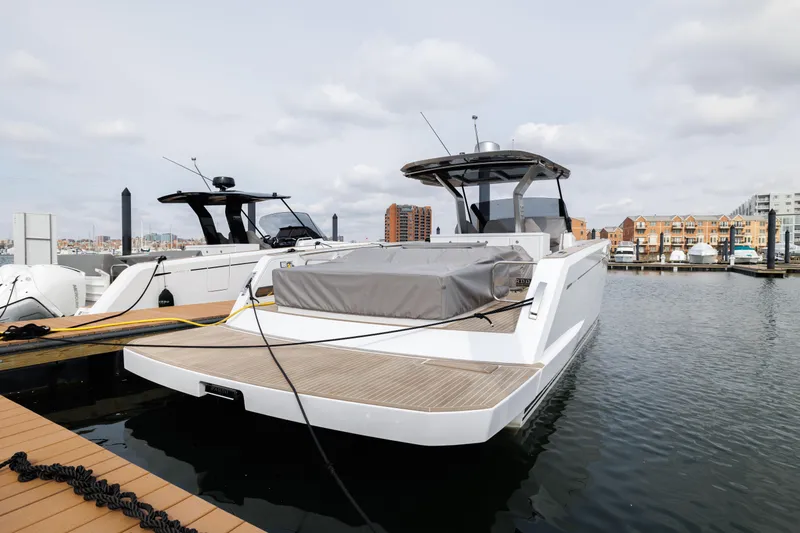 Slide: The Image of 2024 Pardo Yachts 43 docked at a marina. - 2