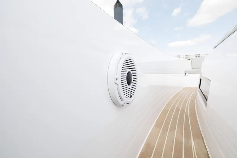 Slide: The Image of Close-up of the deck and speaker on a 2024 Pardo Yachts 43. - 30