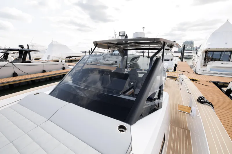 Slide: The Image of 2024 Pardo Yachts 43 docked, showcasing sleek design and modern features. - 34