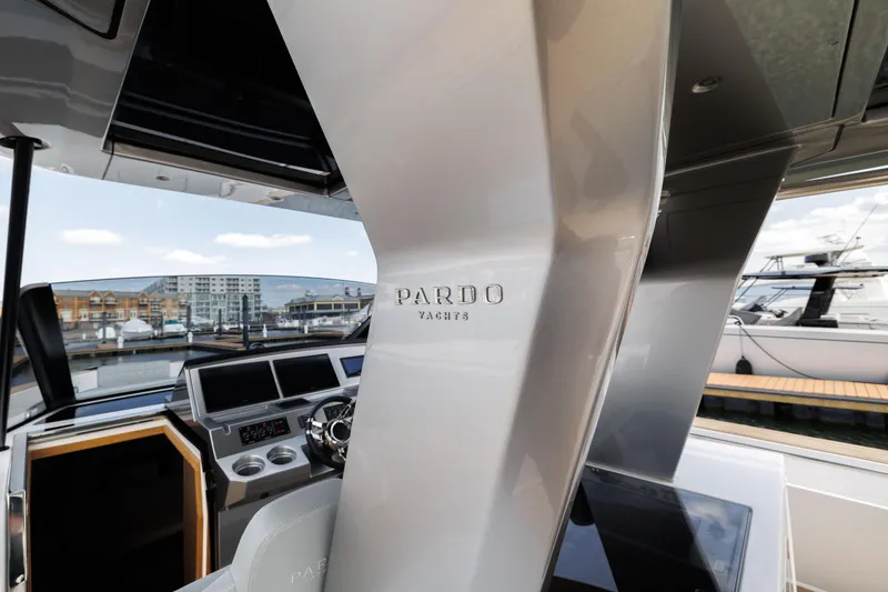Slide: The Image of 2024 Pardo Yachts 43 helm station with modern controls and sleek design. - 36