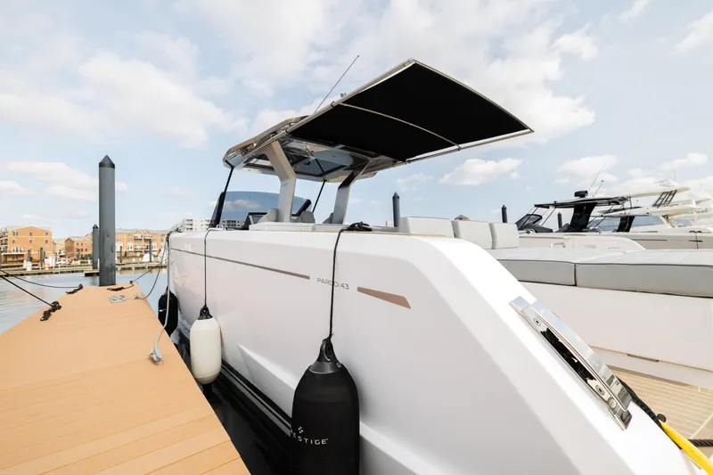 Slide: The Image of 2024 Pardo Yachts 43 docked, showcasing sleek design and modern features. - 43
