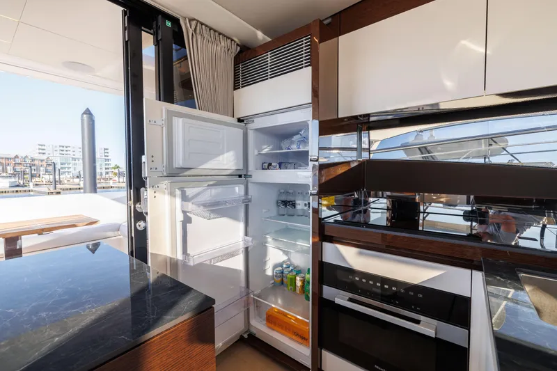 Slide: The Image of Modern kitchen on a 2026 Prestige 520 yacht. - 20