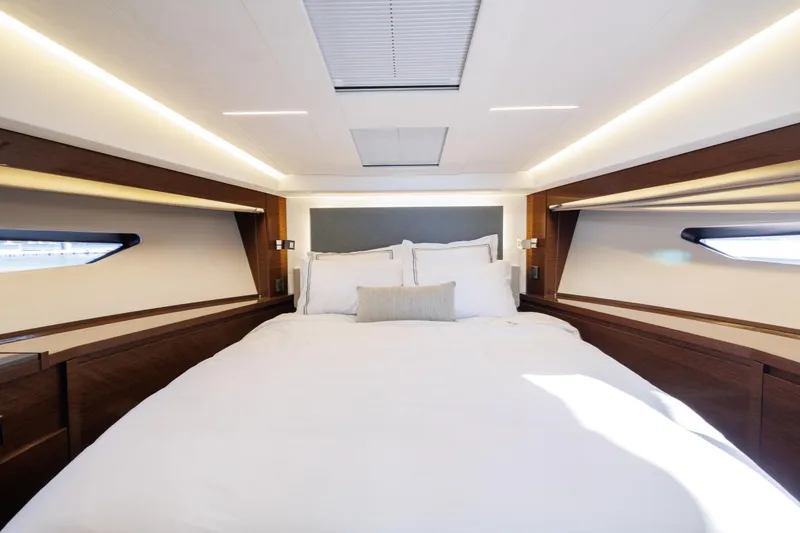 Slide: The Image of Luxurious bedroom in the 2026 Prestige 520 yacht model. - 27