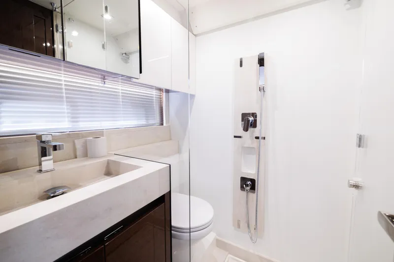 Slide: The Image of Luxurious bathroom in Prestige 520 yacht model, year 2026. - 31