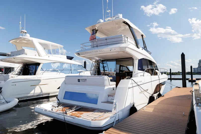 Slide: The Image of Luxurious bedroom in the 2026 Prestige 520 yacht model. - 32