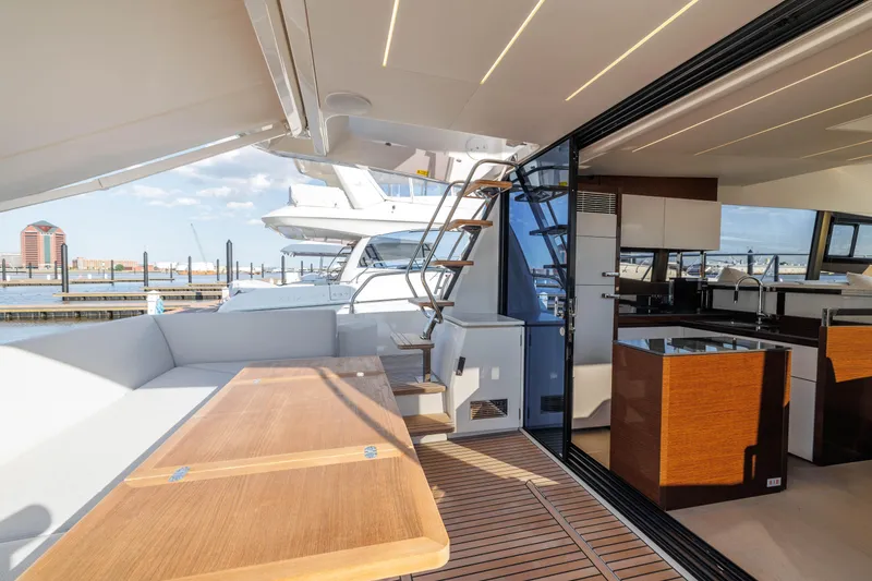 Slide: The Image of Luxury yacht Prestige 520 from 2026 on water at sunset. - 37