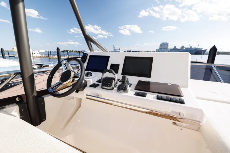 Slide: The Image of Luxury yacht Prestige 520 from 2026 on calm waters. - 40