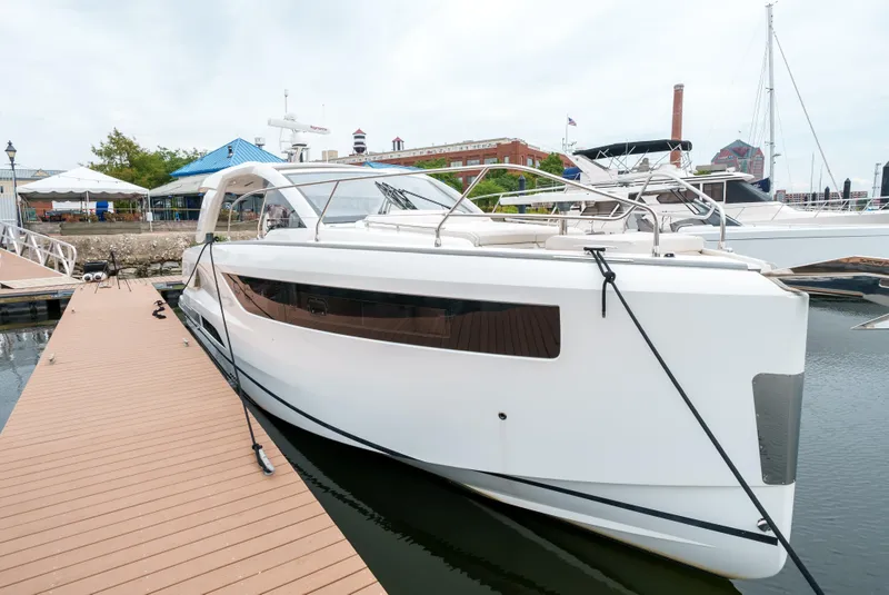 Slide: The Image of 2024 Jeanneau DB|43 Outboard yacht docked at marina. - 12