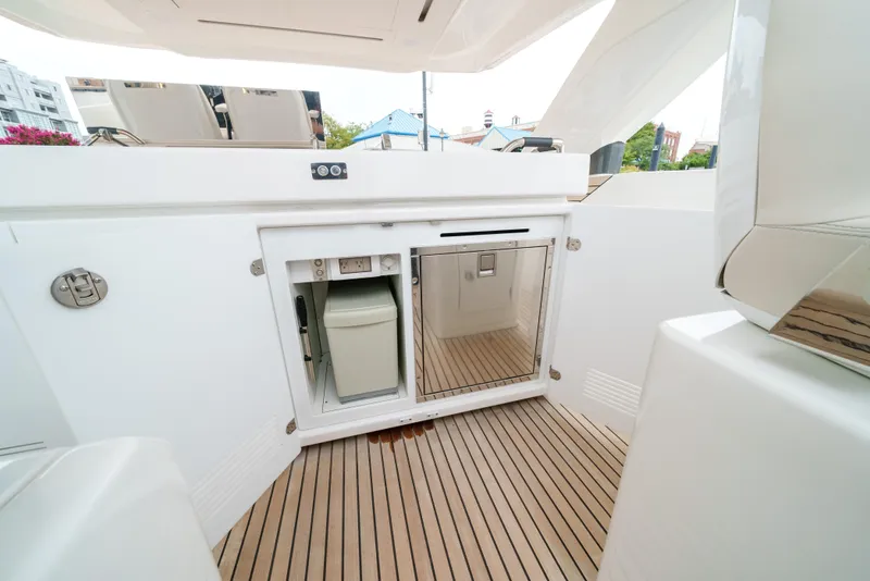 Slide: The Image of 2024 Jeanneau DB|43 Outboard yacht interior with sleek cabinetry and wooden flooring. - 29