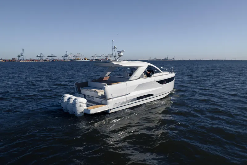 Slide: The Image of 2024 Jeanneau DB|43 Outboard cruising on open water. - 3