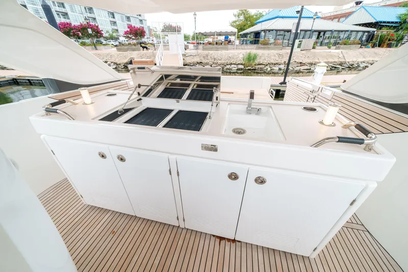 Slide: The Image of Outdoor kitchen on 2024 Jeanneau DB|43 Outboard yacht with grill and sink. - 32
