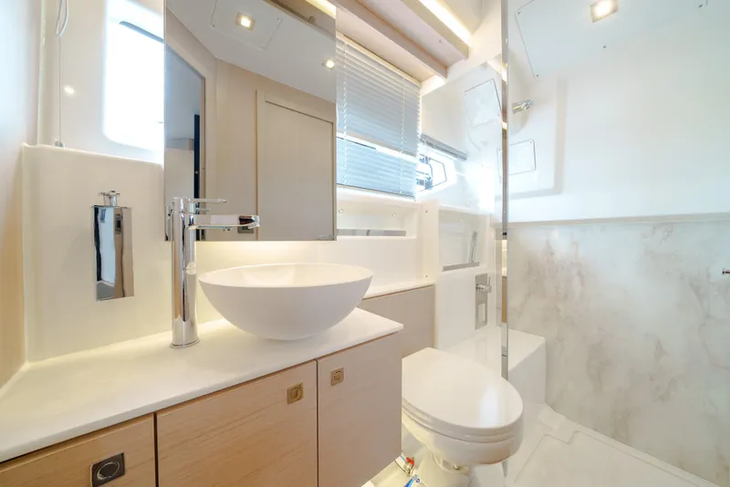 Slide: The Image of Luxurious bathroom in 2024 Jeanneau DB|43 Outboard yacht, featuring modern fixtures and elegant design. - 38