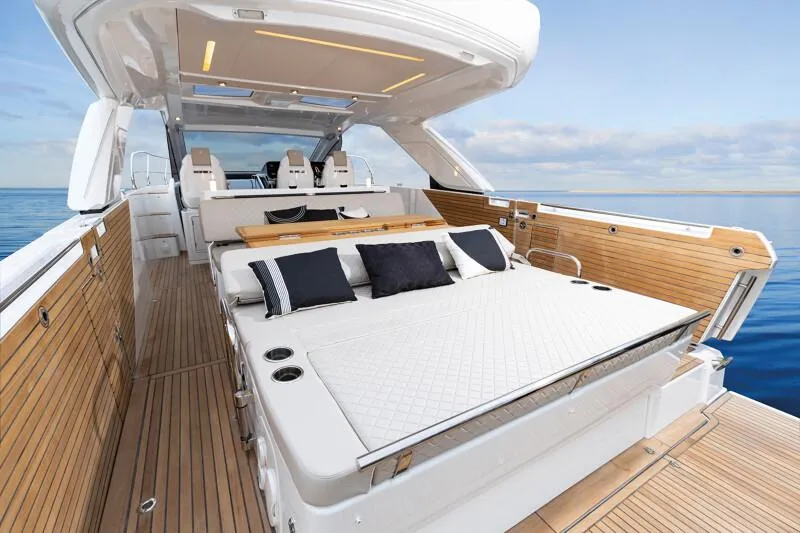 Slide: The Image of 2025 Jeanneau DB|43 Inboard luxury yacht with spacious deck and sunbed. - 10
