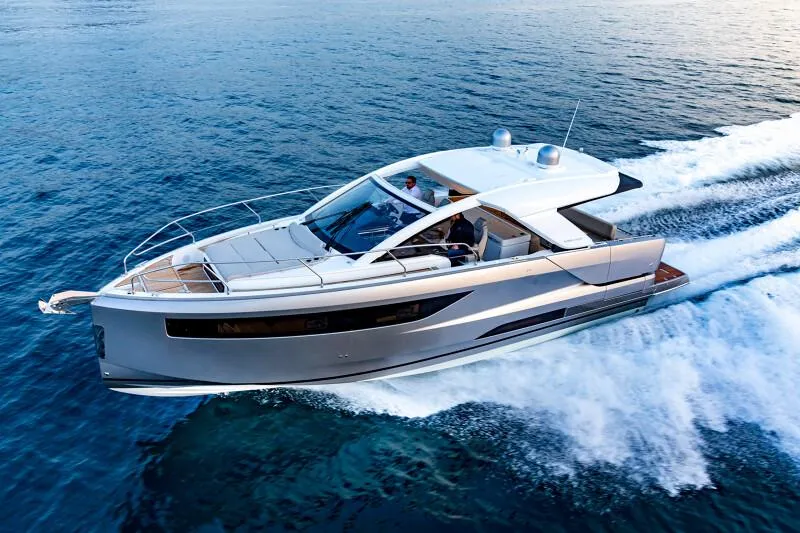 Slide: The Image of 2025 Jeanneau DB|43 Inboard luxury yacht cruising on the ocean. - 18