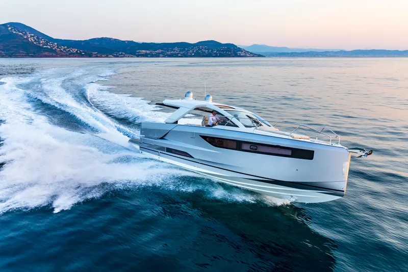 Slide: The Image of 2025 Jeanneau DB|43 Inboard luxury yacht cruising on open water. - 28