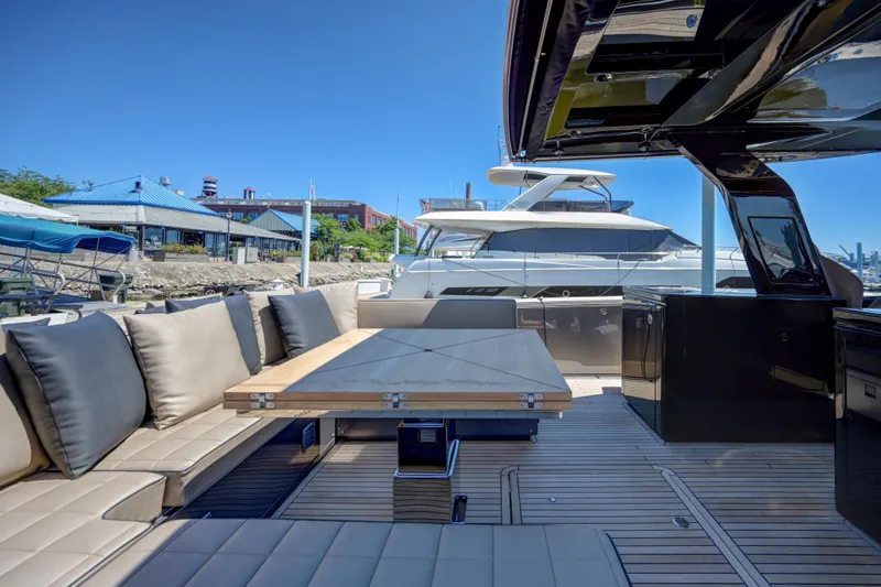 Slide: The Image of Luxurious deck of 2025 Pardo Yachts 50 with seating and dining area. - 22