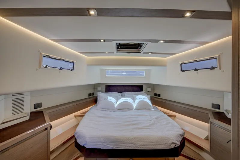 Slide: The Image of Luxurious bedroom interior of 2025 Pardo Yachts 50 with modern lighting and cozy bedding. - 10