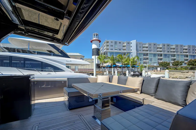 Slide: The Image of Luxury deck of 2025 Pardo Yachts 50 with modern seating and table. - 20