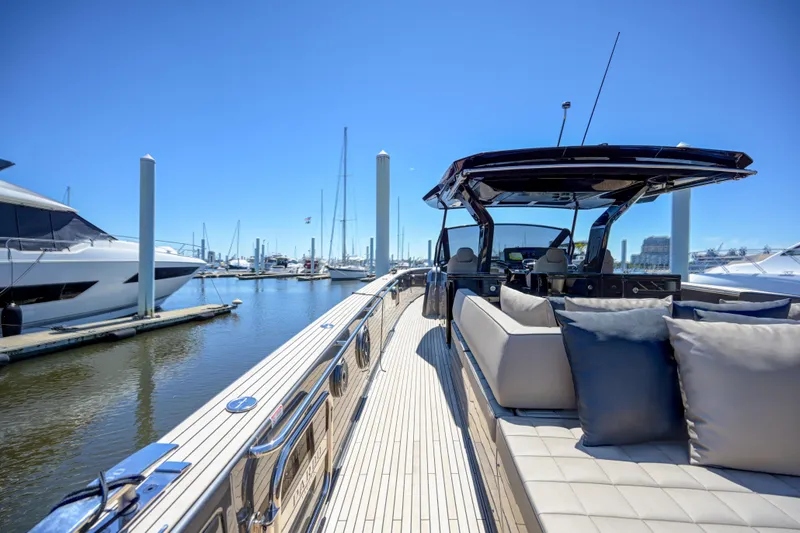 Slide: The Image of Pardo Yachts 50 (2025) luxury yacht docked at marina on a sunny day. - 32