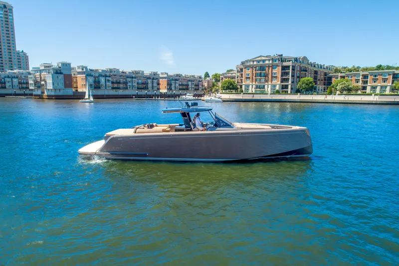 Slide: The Image of 2025 Pardo Yachts 50 cruising in a scenic urban waterfront. - 5