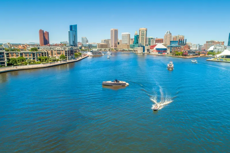 Slide: The Image of Aerial view of a 2025 Pardo Yachts 50 in a vibrant city harbor. - 9