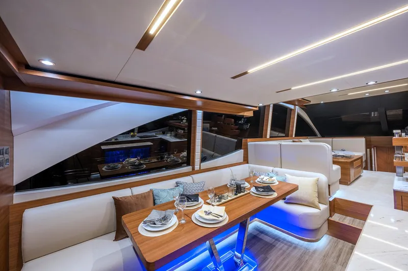 Slide: The Image of Luxurious interior of 2025 Dyna 63 yacht with elegant dining area. - 17