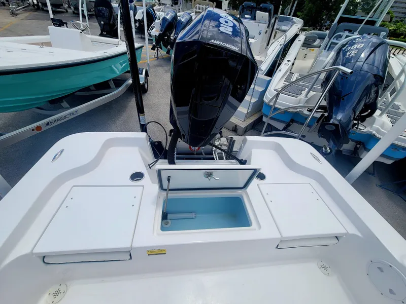 Slide: The Image of 2025 Piranha Casador B2200 boat with outboard motor, featuring a spacious deck layout. - 12