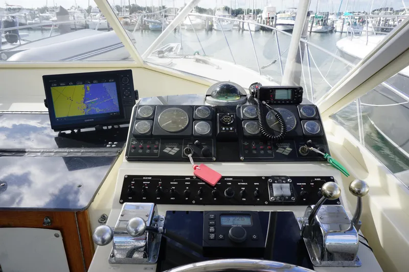 Slide: The Image of Control panel of a 1985 Hatteras 36 Convertible boat with navigation equipment. - 29