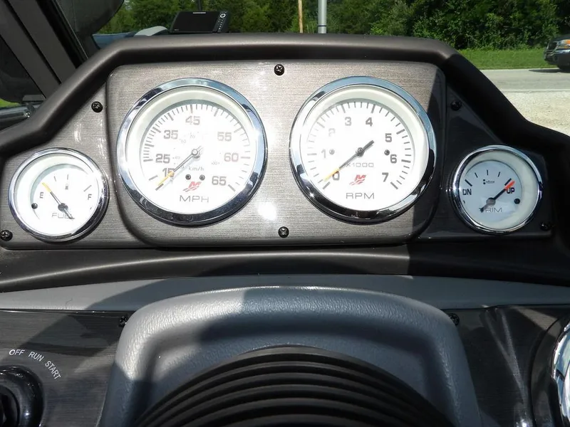 Slide: The Image of Dashboard of 2019 Lund 1975 Pro V Sport boat with speedometer, tachometer, and fuel gauge. - 26