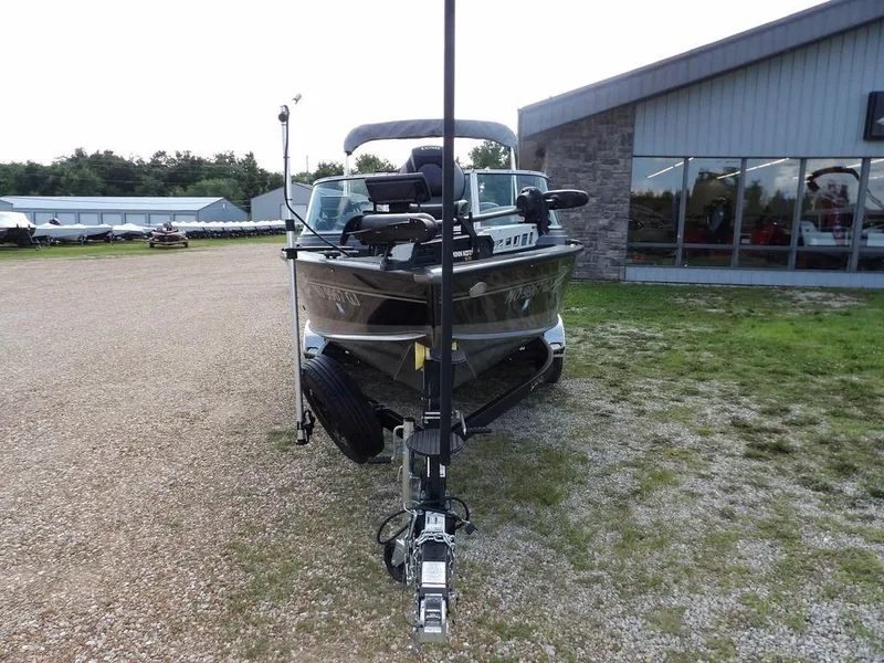 Slide: The Image of 2019 Lund 1975 Pro V Sport boat on trailer outside dealership. - 3
