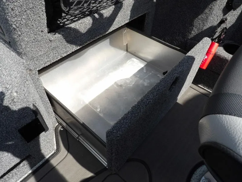 Slide: The Image of Open storage compartment in 2019 Lund 1975 Pro V Sport boat interior. - 31