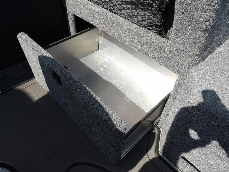 Slide: The Image of Open storage compartment in 2019 Lund 1975 Pro V Sport boat. - 39