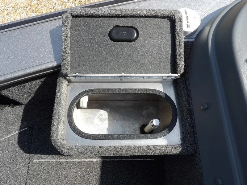 Slide: The Image of Open storage compartment in 2019 Lund 1975 Pro V Sport boat. - 44