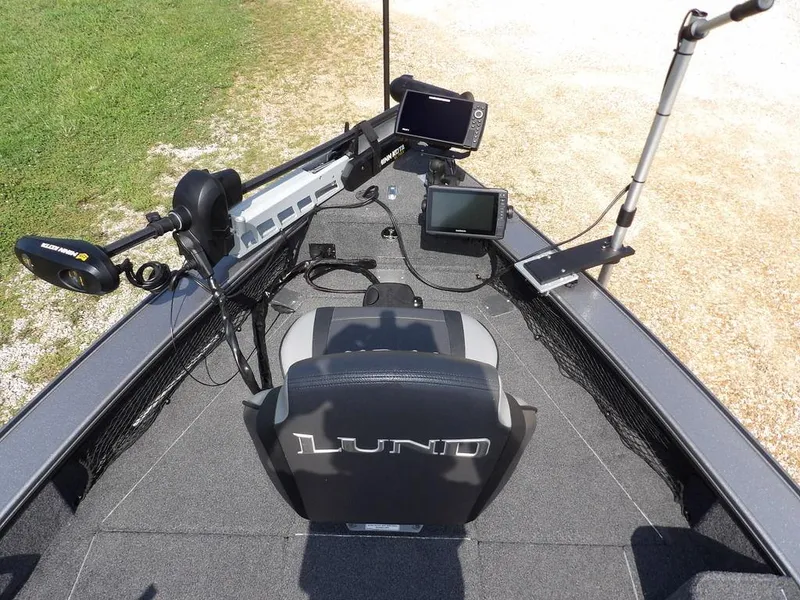 Slide: The Image of 2019 Lund 1975 Pro V Sport boat interior with advanced navigation equipment. - 49